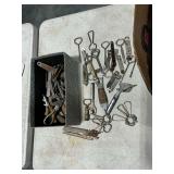 Large assortment of bottle openers and church keys