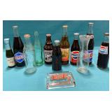 Soda bottles, Pepsi, Coke and others.