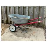 Wheelbarrow, metal tub, shows some rust
