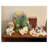 Rabbit figurines, vases with eggs, Jesus Calling book, etc.