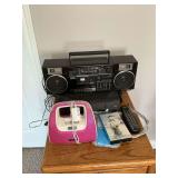 RCA VHS player with remote, Memorex docking station