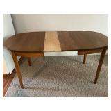 Dining table with (2) 9' leaves