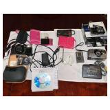 Fujifilm FinePix Z with case, Sony Cyber-shot camera, Kodak Trimlite Instamatic 18 camera