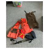 Pair of Wick blaze orange shooting vests, Wick gaiters