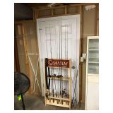Quantum wooden fishing rod holder with rods and reels