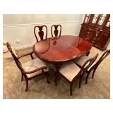 Stanley made Queen Anne style dining table with 4 straight chairs, 2 captain chairs