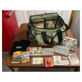 Orvis fly fishing soft sided bag with large assortment of fly fishing supplies