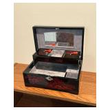 Oriental themed lacquered jewelry box with music box