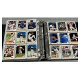 Trading card album with an assortment of baseball cards