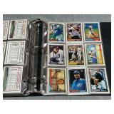 Trading card album with an assortment of baseball cards