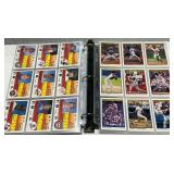 Trading card album with an assortment of baseball cards