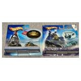 Hot Wheels Tomb Raider and Batman vs. Mr. Freeze die cast cars.