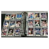 Trading card album with an assortment of baseball cards