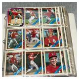 Trading card album with an assortment of baseball cards