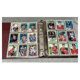 Trading card album with an assortment of baseball cards