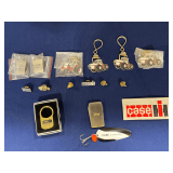 Case IH keychains, lapel pens, tie-tacks and knives