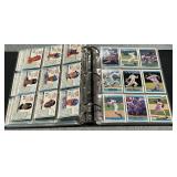 Trading card album with an assortment of baseball cards