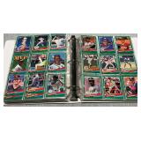 Trading card album with an assortment of baseball cards