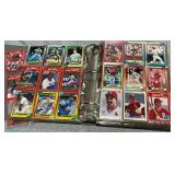 Trading card album with an assortment of baseball cards