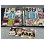 Trading card album with an assortment of baseball cards