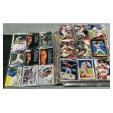 Trading card album with an assortment of baseball cards