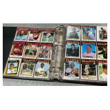 Trading card album with an assortment of baseball cards