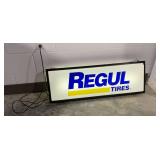Regul Tires advertising light