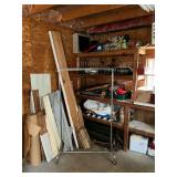 Contents of corner, clothing rack, log roller