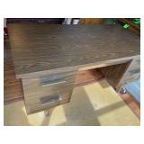 Desk 60" L x 30" W x 35" T, and contents