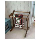 Quilt rack, 30 1/2" W x 24 1/2" D x 36" T with Christmas quilt