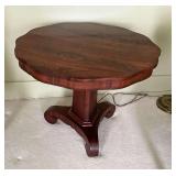 Single pedestal table