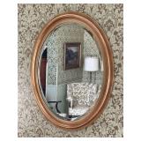 Bevel edged mirror with gold tone frame