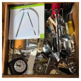 Assortment of utensils, jar vise, tongs, masher