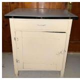 Antique cabinet with enamel top