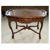 Ornate coffee table with lift off glass tray