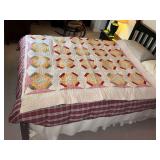 Patchwork hand quilted quilt, damage