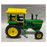 ERTL John Deere 4010 Diesel die cast, Hiniker 1300 cab, like new condition.