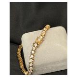 Sterling S-link tennis bracelet with round cut clear stones