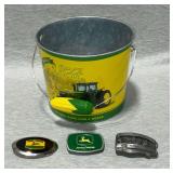 John Deere tin bucket, belt buckles.
