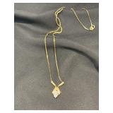 14KT gold pendant with round brilliant cut diamonds on sterling chain