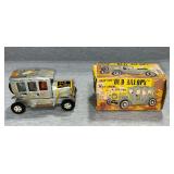Friction "Old Jalopy" with siren & driver in original box