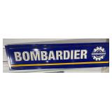 Bombardier plastic sign, 96" L x 24" T.