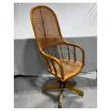 Antique office chair with woven bottom and back