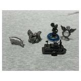 Collection of pewter pieces and ship pencil sharpener
