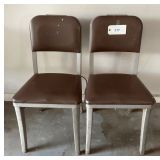 Two Cushioned Metal Chairs
