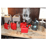 (2) Plastic Water Jugs, (3) 2-Gallon Plastic Gas Cans, (2) 1-Gallon Plastic Gas Cans, and (2) Rubbermaid 6-Gallon Fuel Cans