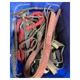 Various tack items cinches lead ropes halters and more