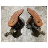 Set of spurs with etched side plates and tooled straps