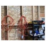 Extension cords! On wall and top shelf