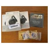 Three screen caster devices, two trump coins and golden eagle pin